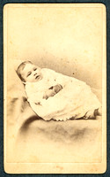 Portrait of a baby taken by photographer T. D. Lewis of Kingston, New York.