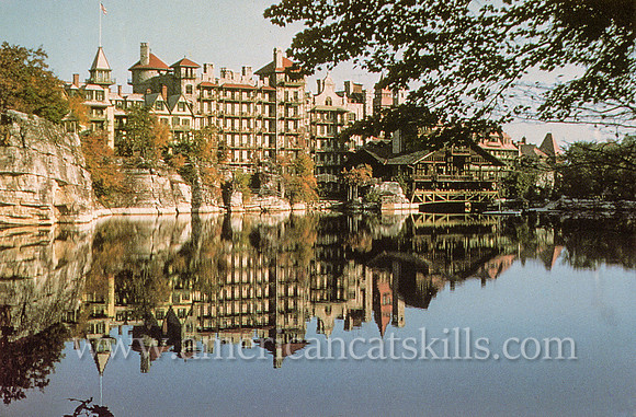 Mohonk Mountain House is reflected in Tranquil Lake Mohonk
