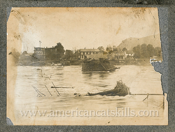 Vintage photograph showing flooding on the Delaware River published by photographer Walter Taylor of Port Jervis, New York.
