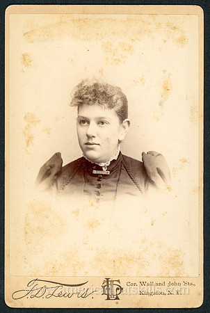 Portrait of a woman taken by photographer T. D. Lewis of Kingston, New York.