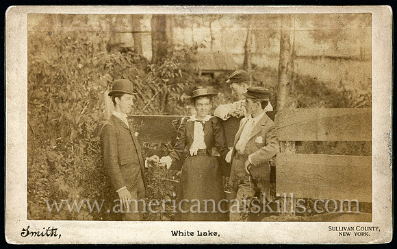Vintage photograph of a group of friends taken by photographer John H. Smith of White Lake, New York.