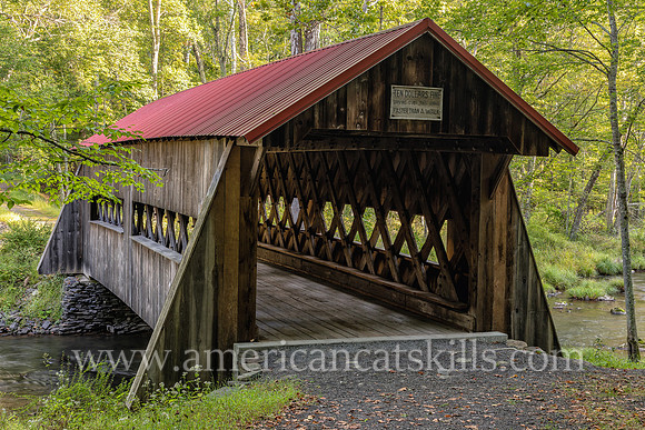 Photograph of the Ashokan-Turnwood Covered Bridge, located at the Ashkokan Center in the Catskills hamlet of Olivebridge, New York.