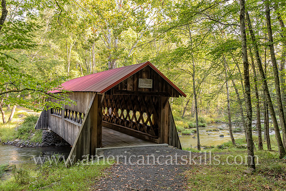 Photograph of the Ashokan-Turnwood Covered Bridge, located at the Ashkokan Center in the Catskills hamlet of Olivebridge, New York.