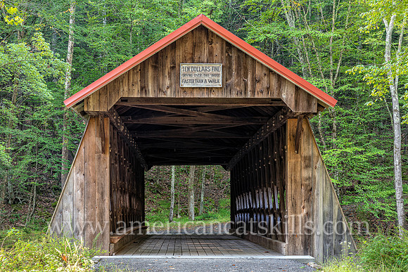Photograph of the Ashokan-Turnwood Covered Bridge, located at the Ashkokan Center in the Catskills hamlet of Olivebridge, New York.