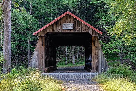 Photograph of the Ashokan-Turnwood Covered Bridge, located at the Ashkokan Center in the Catskills hamlet of Olivebridge, New York.