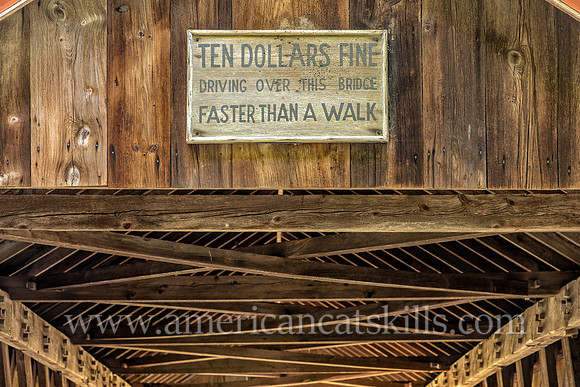 Photograph of the Ashokan-Turnwood Covered Bridge, located at the Ashkokan Center in the Catskills hamlet of Olivebridge, New York.