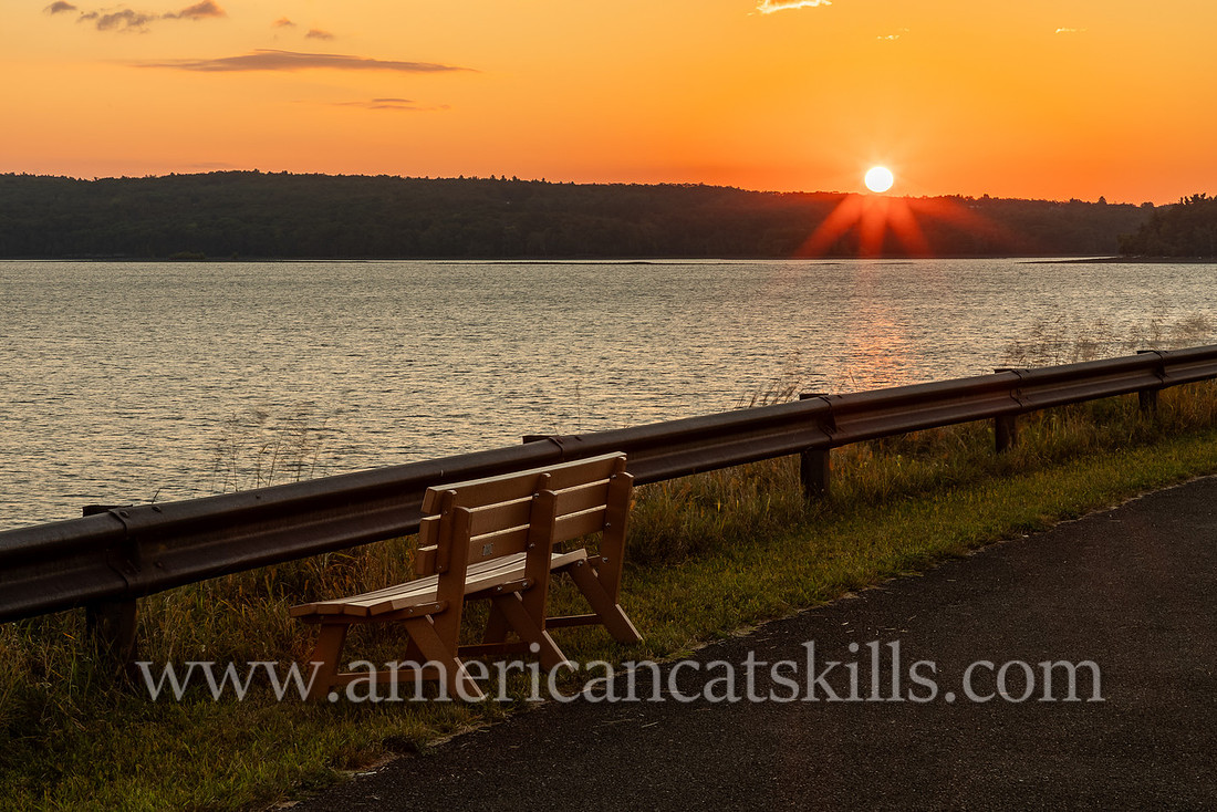 Photograph of the sunrise at the Ashokan Reservoir in the Catskills region of New York.