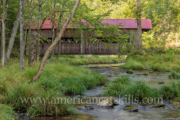 Photograph of the Ashokan-Turnwood Covered Bridge, located at the Ashkokan Center in the Catskills hamlet of Olivebridge, New York.