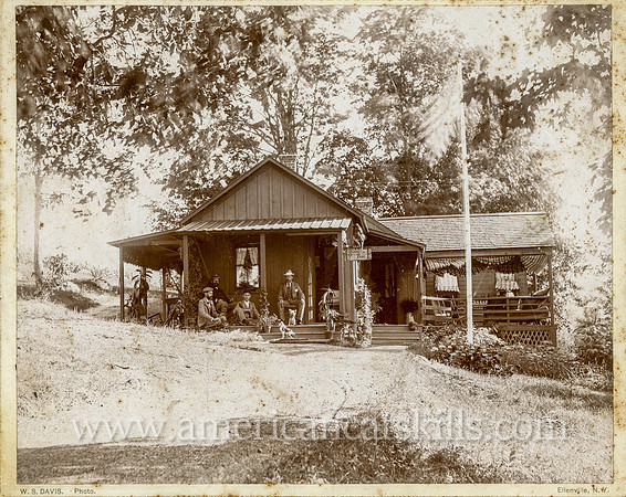 Photograph of a group of men in front of Sunny Brae, taken by photographer Winfield S. Davis.