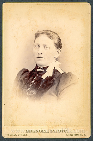 Portrait of a well-dressed woman taken by photographer John N. Brengel of Rondout and Kingston, New York.