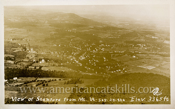 Photograph titled "View of Stamford from Mt. Ut-say-an-tha, Elev. 3365 ft." by Perry Dibble, a photographer from Stamford, New York.