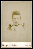 Portrait of a young woman taken by photographer A. G. Kitchen of Deposit, New York.