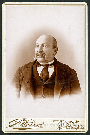Portrait of a man in a suit by Anson Vance Card of Kingston, New York.