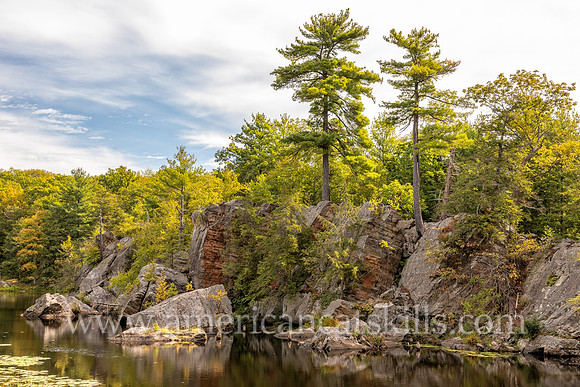 Photograph of rocky cliffs on the pond at the John Burroughs Nature Sanctuary in West Park, New York.