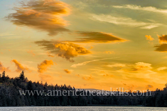 Photograph of clouds in late evening light at North-South Lake in Haines Falls, New York.