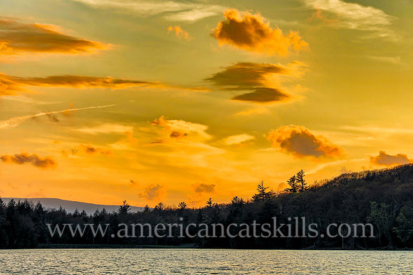 Photograph of clouds in late evening light at North-South Lake in Haines Falls, New York.