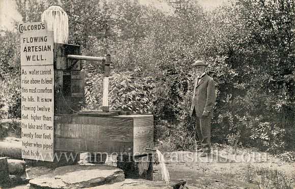 Vintage postcard titled "Colcord's Flowing Artesian Well"