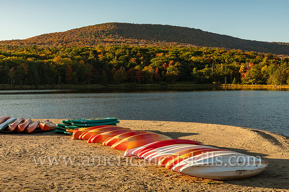 Photographs of kayaks on the beach of North-South Lake in the northern Catskills.