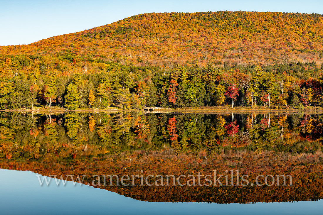 Photograph of a mountain reflecting in the lake at North-South Lake in the Catskills.