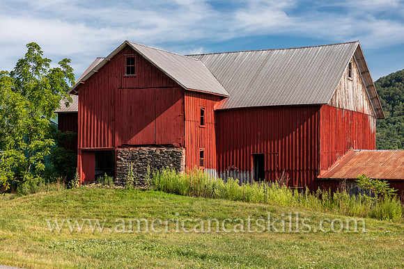 Photograph of a red colored barn near Colchester and Hawleys in Delaware County, New York.
