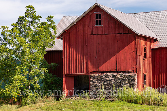 Photograph of a red colored barn near Colchester and Hawleys in Delaware County, New York.