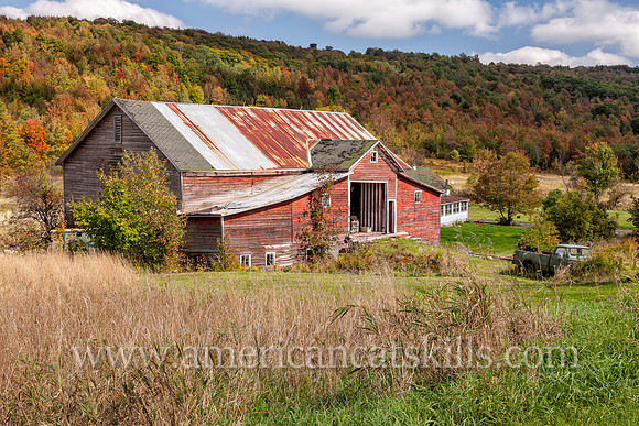 Photograph of an old barn with fading red paint near Lexington in Greene County, New York.