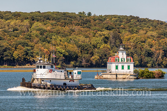 Photograph of the Catherine C. Miller passing the Esopus Meadows Lighthouse on the Hudson River.