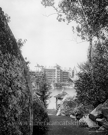 Glimpse of hotel and lake, Lake Mohonk, N.Y.