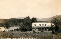 Scenic photograph titled "Kirkside Lake and Cottage, Roxbury, N.Y." by photographer J. H. Dearstyne of Binghamton, New York.