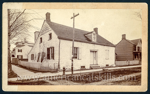 Photograph of an historic building at the corner of Wall Street and Pearl Street in Kingston, New York by photographer Theodore D. Lewis.