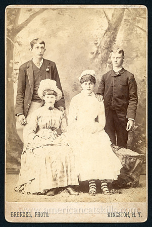Portrait of two young men with two young women by photographer John N. Brengel of Kingston, New York.