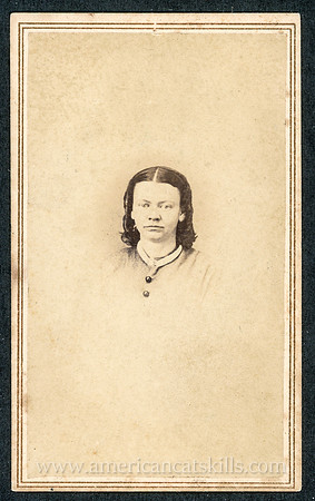 Portrait of a young woman by photographer N. A. Beers of Franklin, New York.