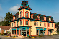 Photograph of the historic Bussy Building in the village of Margaretville, New York.