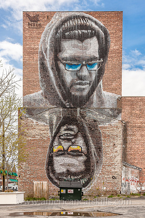 The large scale mural known as “Matt” adorns the side of brick building in the Stockade District of historic Kingston. It was created in 2014 by Nils Westergaard, a well known street artist and film m