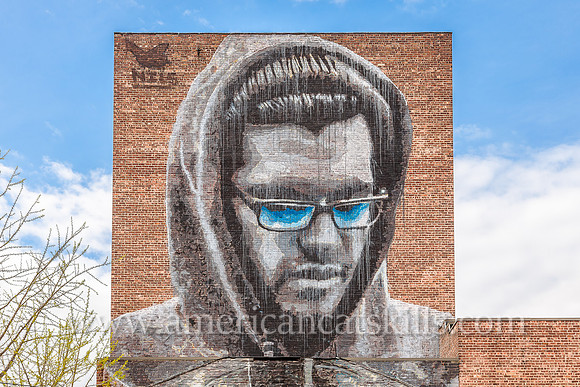 The large scale mural known as “Matt” adorns the side of brick building in the Stockade District of historic Kingston. It was created in 2014 by Nils Westergaard, a well known street artist and film m