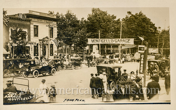 Vintage postcard titled "July 4th Parade, Monticello, N. Y. (1)" published by photographer Howard P. Thompson of Monticello, New York.