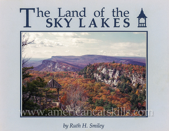 Cover of the book titled "The Land of the Sky Lakes" by photographer Ruth H. Smiley.