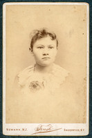 Portrait of a young woman taken by photographer William L. Teush of Saugerties, New York.