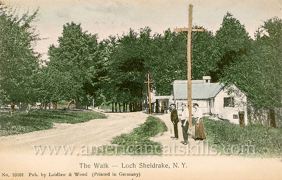 Vintage postcard titled "The Walk - Loch Sheldrake, N. Y." published by the photographic firm of Laidlaw and Wood of Hurleyville, New York.