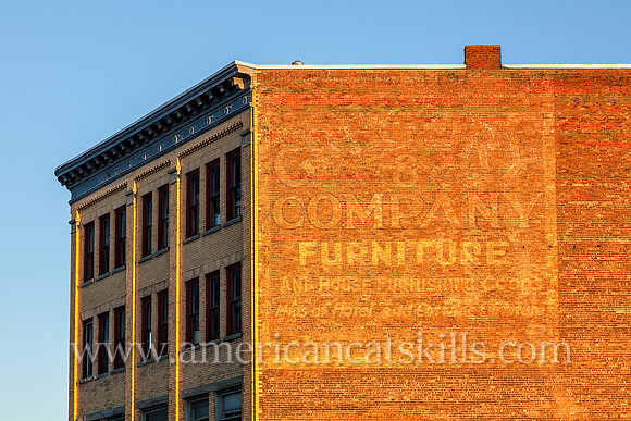 In a testament to the past, this old ghost sign advertises Gregory & Co. in Kingston, New York. Gregory & Co. was a wholesale and retail home and furniture business.