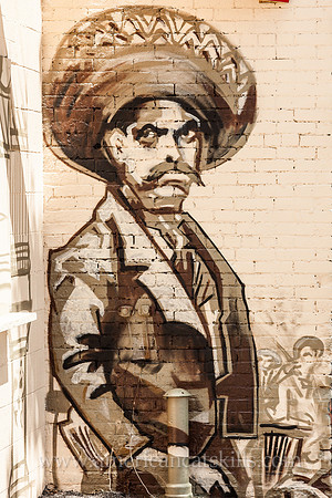 Mural of a man wearing a sombrero at the La Hacienda restaurant in midtown Kingston, New York.