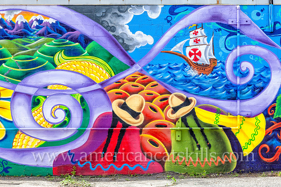The midtown mural titled “Native Americans Discover Columbus” was created during the 2016 and 7th annual O+ Festival by well known artist Lady Pink.