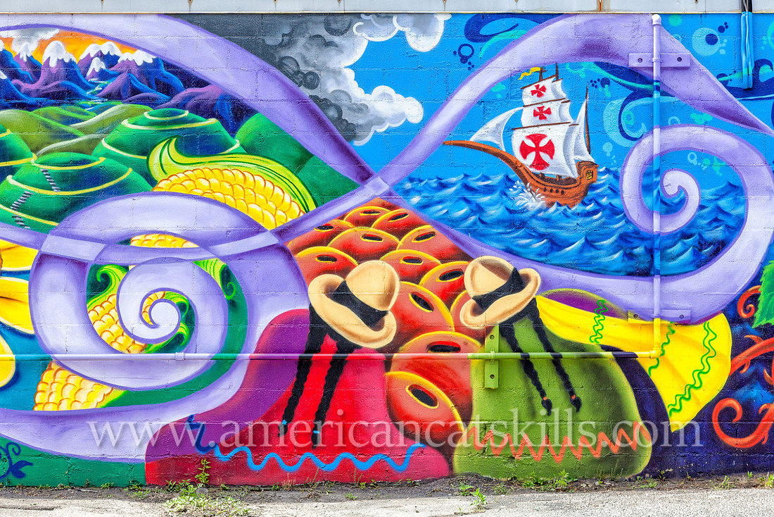 The midtown mural titled “Native Americans Discover Columbus” was created during the 2016 and 7th annual O+ Festival by well known artist Lady Pink.