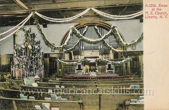 Photographer Otto Hillig of Liberty, New York published this vintage postcard titled “Xmas at the M. E. Church, Liberty, N.Y.”