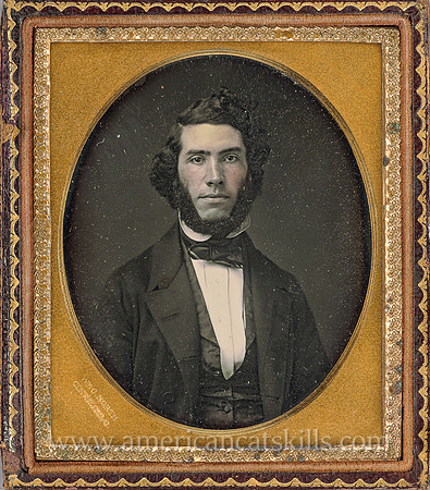 Portrait of a young man with thick chin beard