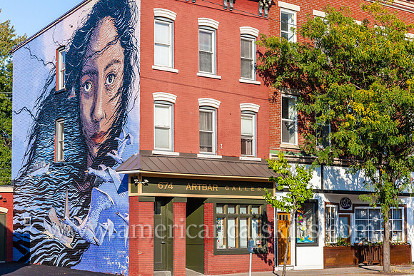 The three-story mural titled “O Wind, Take Me To My Country” was created by artists Jess X. Chen and Jia Sung as part of the 2016 O+ festival in Kingston.