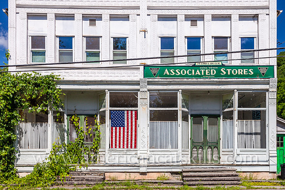 The long vacant Associated Stores of J. M. Schmidt & Sons Co. Inc. can be seen within the small Sullivan County hamlet of North Branch.