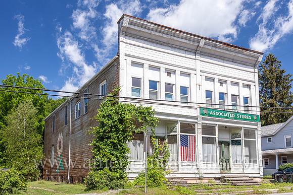 The long vacant Associated Stores of J. M. Schmidt & Sons Co. Inc. can be seen within the small Sullivan County hamlet of North Branch.