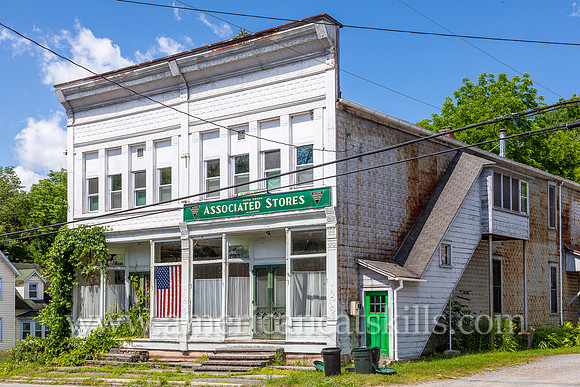 The long vacant Associated Stores of J. M. Schmidt & Sons Co. Inc. can be seen within the small Sullivan County hamlet of North Branch.
