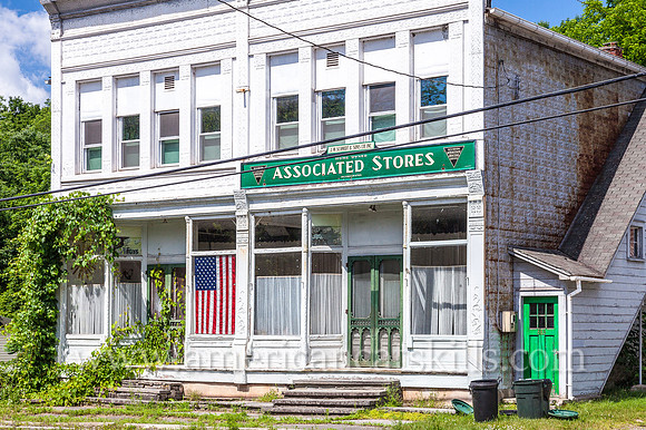 The long vacant Associated Stores of J. M. Schmidt & Sons Co. Inc. can be seen within the small Sullivan County hamlet of North Branch.